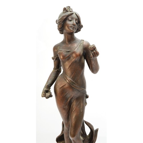 247 - After Aristide de Ranieri (Italian 1865-1954); La Rose, a patinated spelter figure of a lady holding... 