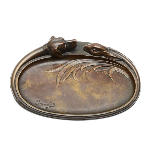 248 - Maurice Osmond (1875-1951, French), a cast bronze oval pin dish, the outer rim cast with a dogs head... 