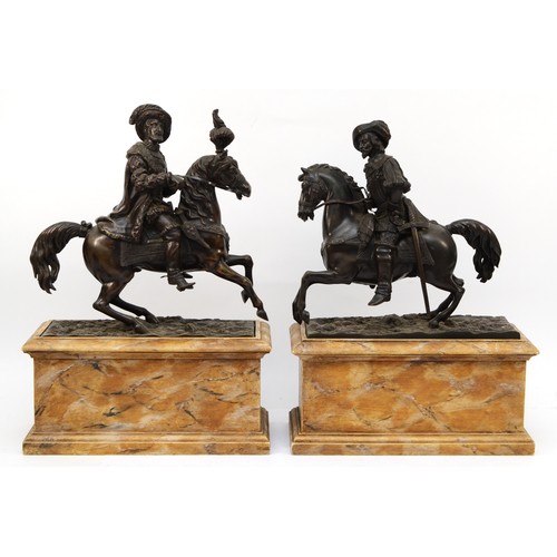 250 - A pair of late 19th/early 20th century, possibly French bronze rearing horses, each with a cavalier ... 