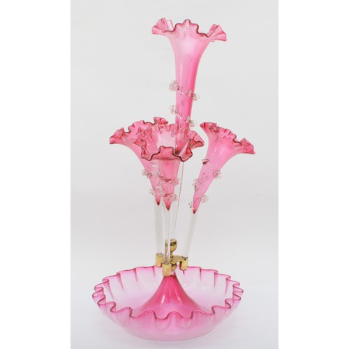 271 - A late 19th/early 20th century cranberry glass three trumpet epergne with central trumpet, standig i... 