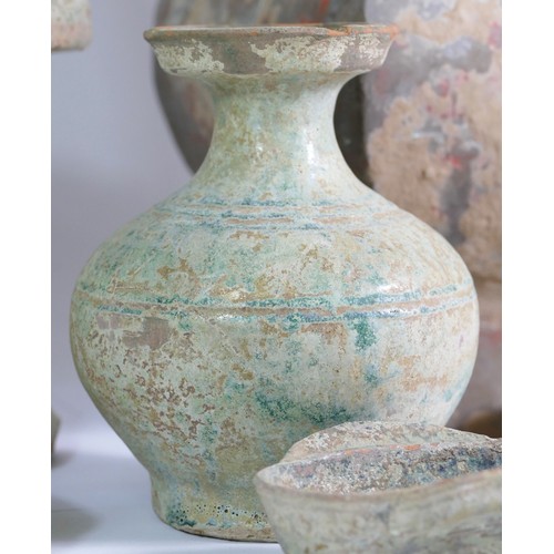 290 - A Chinese Han Dynasty, (206BC - 220AD), a collection of eight pottery pieces.
Provenance; from the c... 