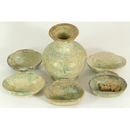 290 - A Chinese Han Dynasty, (206BC - 220AD), a collection of eight pottery pieces.
Provenance; from the c... 