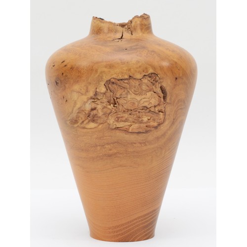 253 - Paul Boak (Contemporary), a turned walnut vase baluster shaped vase, signed to base, 20.5cm high.