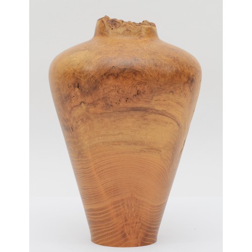 253 - Paul Boak (Contemporary), a turned walnut vase baluster shaped vase, signed to base, 20.5cm high.