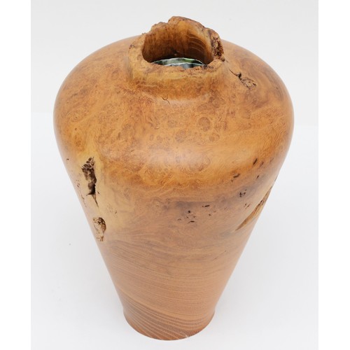 253 - Paul Boak (Contemporary), a turned walnut vase baluster shaped vase, signed to base, 20.5cm high.