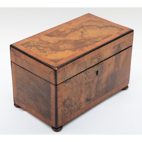 257 - A 19th century burr walnut veneered twin division tea caddy, the hinged lid opening to reveal twin l... 