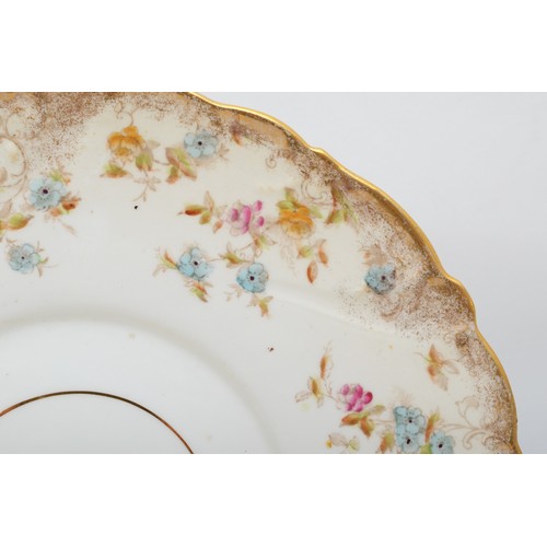 280 - A 19th century gilt and hand painted floral teaset comprising of ten 10cm saucers, eight cups, nine ... 