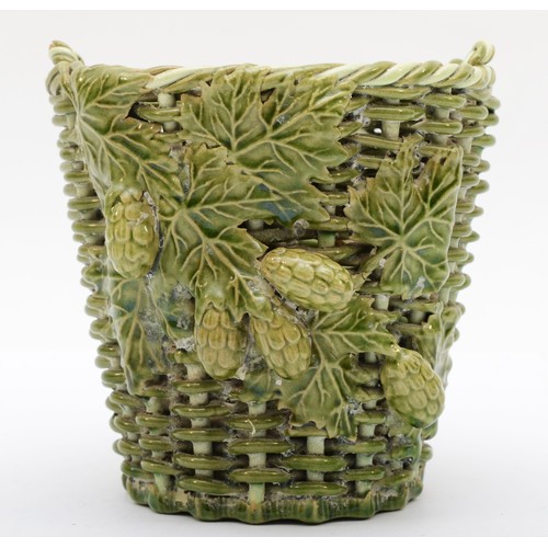 284 - Rye Pottery, a 20th century green glazed pottery basket weave 'wicker' twin handle basket, with appl... 