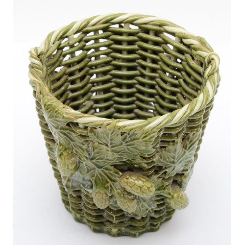 284 - Rye Pottery, a 20th century green glazed pottery basket weave 'wicker' twin handle basket, with appl... 