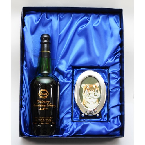 305 - A boxed bottle of commemorative sherry to commemorate the centenary of Esso, together with a silver ... 