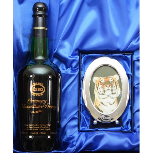 305 - A boxed bottle of commemorative sherry to commemorate the centenary of Esso, together with a silver ... 