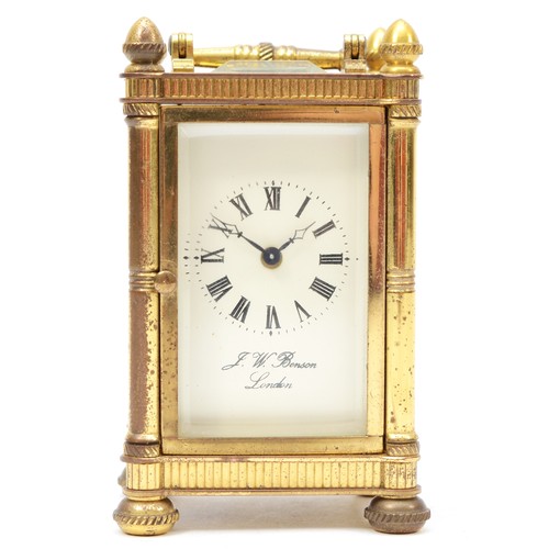 326 - J. W. Benson of London, a small 20th century brass and four glass carriage clock, with brass swing h... 