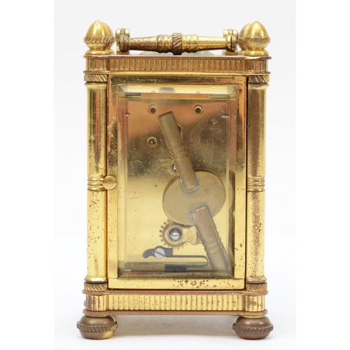 326 - J. W. Benson of London, a small 20th century brass and four glass carriage clock, with brass swing h... 