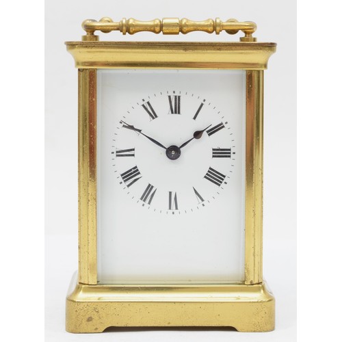 334 - A 20th century corniche brass cased and four glass carriage clock, with swing handle the white dial ... 