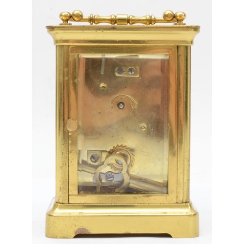 334 - A 20th century corniche brass cased and four glass carriage clock, with swing handle the white dial ... 