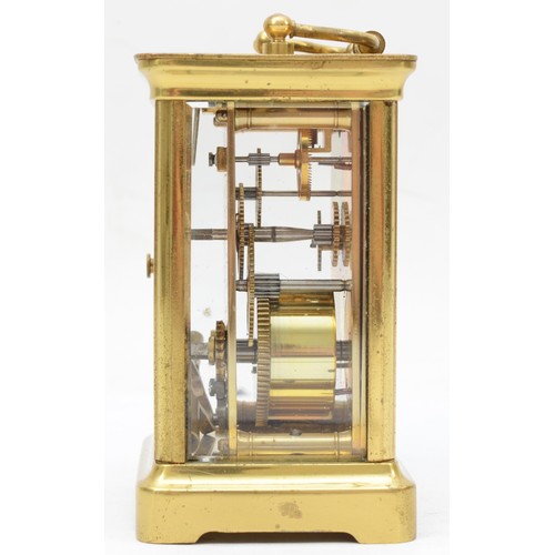 334 - A 20th century corniche brass cased and four glass carriage clock, with swing handle the white dial ... 