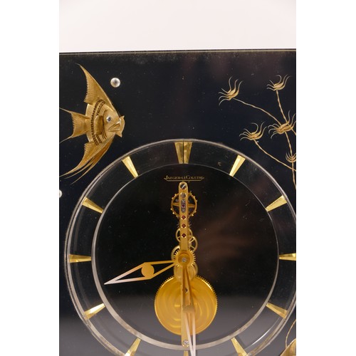 336 - Jaeger le Coultre, a mid 20th century  Perspex cased 'Marina' eight day mantle clock, raised on squa... 