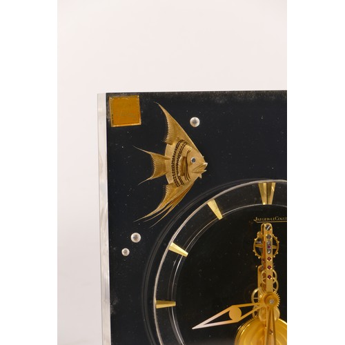 336 - Jaeger le Coultre, a mid 20th century  Perspex cased 'Marina' eight day mantle clock, raised on squa... 