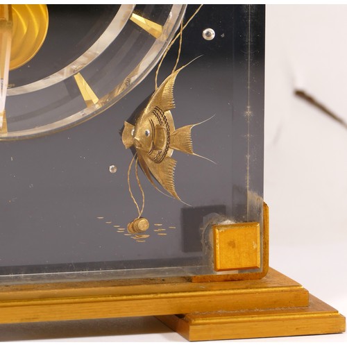 336 - Jaeger le Coultre, a mid 20th century  Perspex cased 'Marina' eight day mantle clock, raised on squa... 