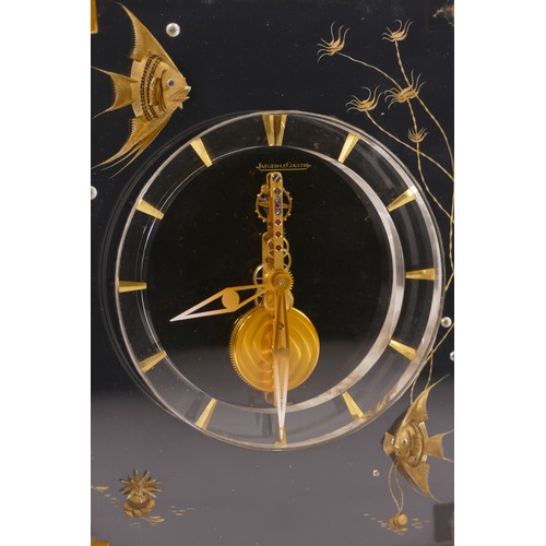 336 - Jaeger le Coultre, a mid 20th century  Perspex cased 'Marina' eight day mantle clock, raised on squa... 