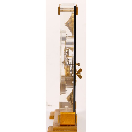 336 - Jaeger le Coultre, a mid 20th century  Perspex cased 'Marina' eight day mantle clock, raised on squa... 