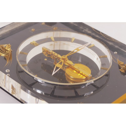 336 - Jaeger le Coultre, a mid 20th century  Perspex cased 'Marina' eight day mantle clock, raised on squa... 