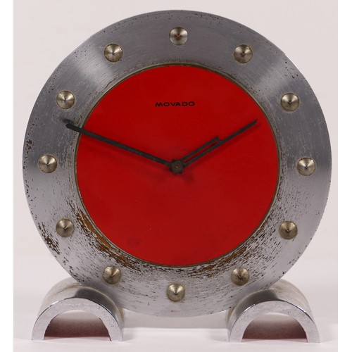 340 - Movado, a mid 20th century brushed steel and red painted desk clock, with applied numerals raised on... 