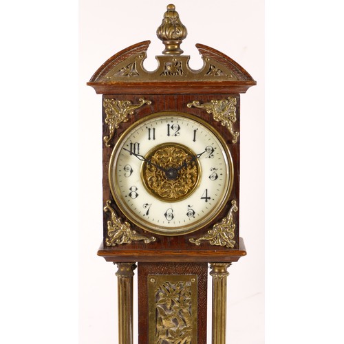 344 - A 19th century oak cased miniature long case clock, with broken swan neck pediment, applied pierced ... 