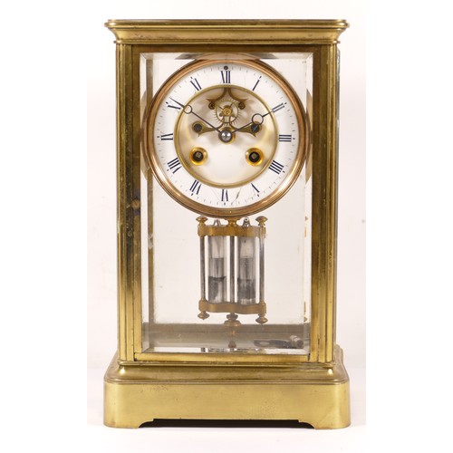 346 - A late 19th/early 20th century brass corniche and four glass mantle clock, the white enamelled dial ... 