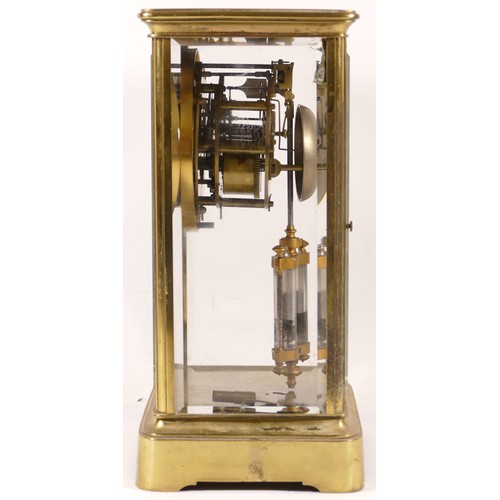 346 - A late 19th/early 20th century brass corniche and four glass mantle clock, the white enamelled dial ... 