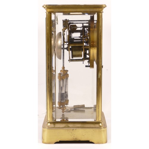 346 - A late 19th/early 20th century brass corniche and four glass mantle clock, the white enamelled dial ... 