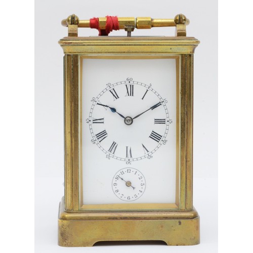 347 - A late 19th century brass corniche cased and four glass repeat striking carriage clock, with swing h... 