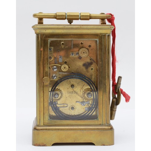 347 - A late 19th century brass corniche cased and four glass repeat striking carriage clock, with swing h... 