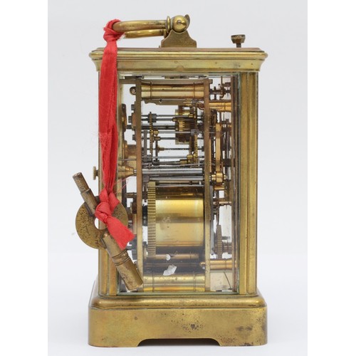 347 - A late 19th century brass corniche cased and four glass repeat striking carriage clock, with swing h... 