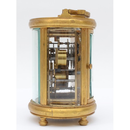 348 - A 20th century oval brass cornice cased and four glass carriage clock, with swing handle, the white ... 