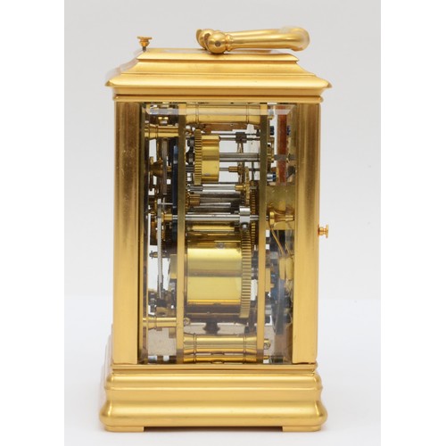 352 - A late 19th century brass corniche cased and four glass presentation striking carriage clock, with s... 