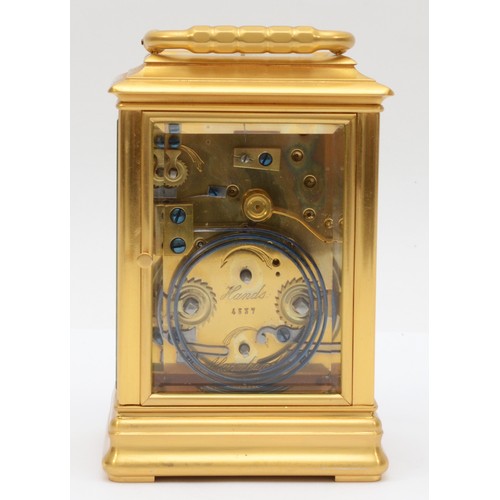 352 - A late 19th century brass corniche cased and four glass presentation striking carriage clock, with s... 