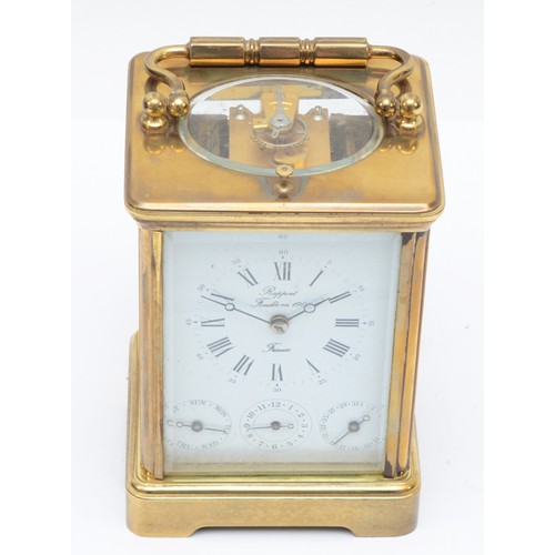 354 - An early 20th century Rapport brass corniche cased and four glass repeating striking carriage clock,... 