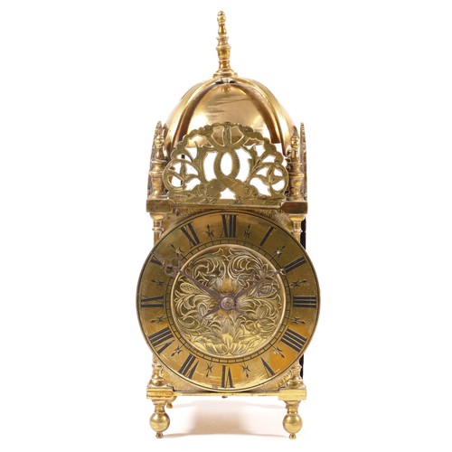 368 - A late 19th century brass lantern clock, the chapter ring with black highlighted Roman numerals, dia... 