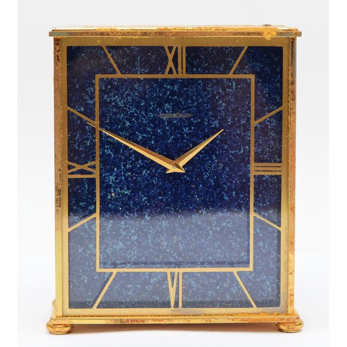 373 - Jaeger-LeCoultre, a 20th century gilt metal cased mantle time piece, with lapis lazuli effect dial, ... 