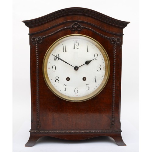 374 - A late 19th century mahogany veneered cased mantle clock, with carved rope twist style decoration, t... 