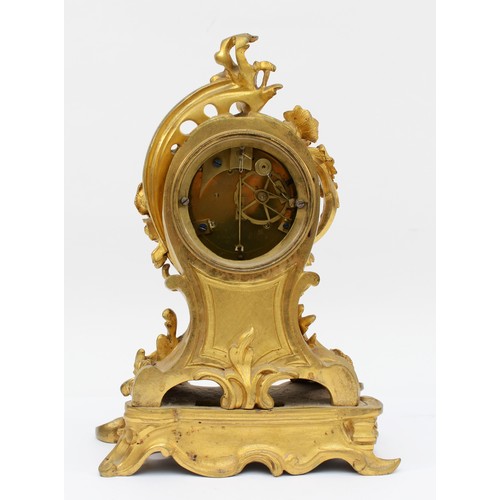 376 - A late 19th century, probably French gilt brass mantle clock, the gilt dial with applied enamel Roma... 