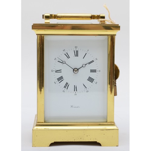 378 - Worcester, a contemporary heavy brass and four glass corniche cased carriage clock, with swing carry... 