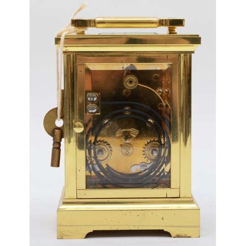 378 - Worcester, a contemporary heavy brass and four glass corniche cased carriage clock, with swing carry... 