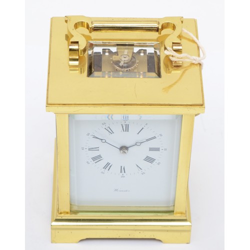 378 - Worcester, a contemporary heavy brass and four glass corniche cased carriage clock, with swing carry... 