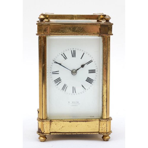 379 - E. White 12 Haymarket London, a 20th century brass and glass corniche cased striking carriage clock,... 