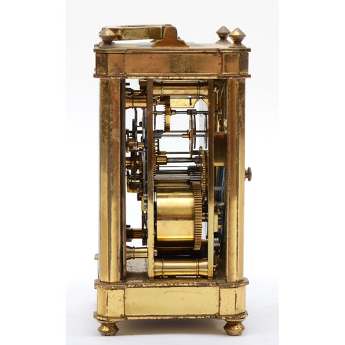 379 - E. White 12 Haymarket London, a 20th century brass and glass corniche cased striking carriage clock,... 