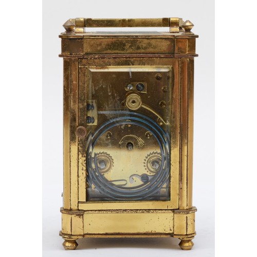 379 - E. White 12 Haymarket London, a 20th century brass and glass corniche cased striking carriage clock,... 