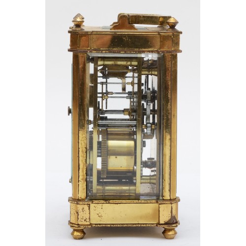 379 - E. White 12 Haymarket London, a 20th century brass and glass corniche cased striking carriage clock,... 