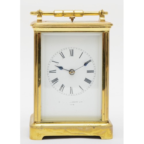 382 - A 20th century French brass and glass corniche cased repeat striking carriage clock, the white dial ... 